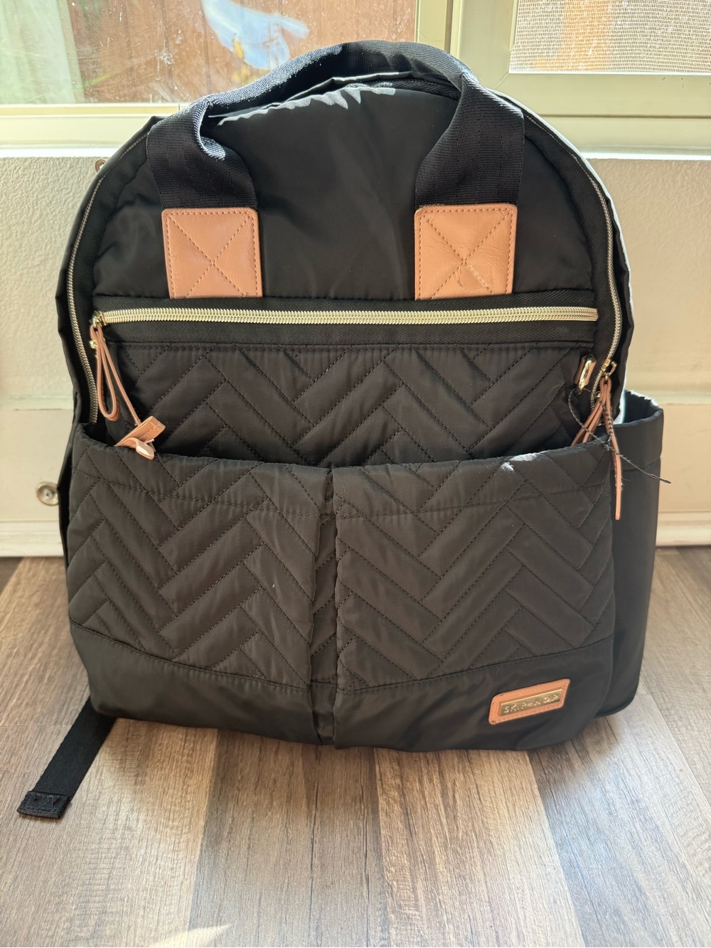 Skip Hop Black Quilted Backpack with Tan Trim